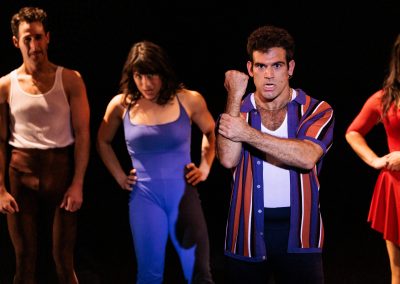 Adam Mandala as Greg (foreground) with Anthony DaSilva as Mike, Sierra Lai Barnett as Connie, and Karli Dinardo as Cassie in The REV Theatre Company’s production of A CHORUS LINE at the Merry-Go-Round Playhouse in Auburn, NY.