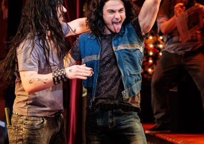 Conner Gillooly as Lonny and Noah Mutterperl as Drew in The REV Theatre Company’s production of ROCK OF AGES.