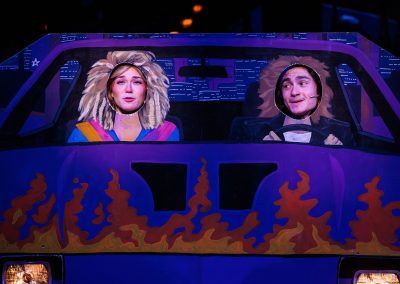 Maggie Gidden as Sherrie and Noah Mutterperl as Drew in The REV Theatre Company’s production of ROCK OF AGES.