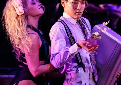 Chloe Rae Kehm (left) and Nolan Um as Mayor in The REV Theatre Company’s production of ROCK OF AGES.
