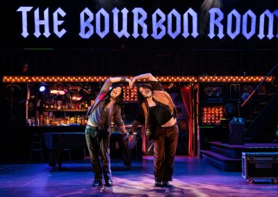 Conner Gillooly (left) as Lonny and Drew Starlin as Dennis Dupree in The REV Theatre Company’s production of ROCK OF AGES.