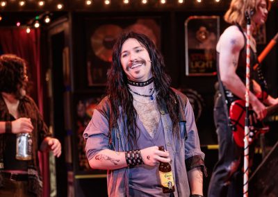 Conner Gillooly as Lonny in The REV Theatre Company’s production of ROCK OF AGES.
